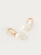 Earrings with heart-shaped pendants