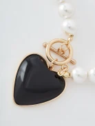 Pearl necklace with heart-shaped pendant