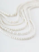 Cascade necklace with pearl beads