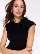 Large black flower-shaped brooch