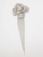 Elegant brooch with a rose and chains