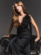 Black brooch with ostrich feathers