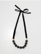 Gold-plated necklace with onyx and hematite stones on a ribbon