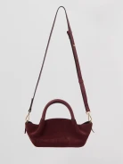 Suede handbag in burgundy