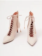 Beige heeled ankle boots made of genuine leather