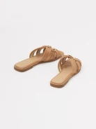 Caramel-colored leather flip-flops with a decorative buckle