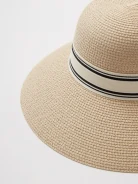 A large hat with a decorative ribbon