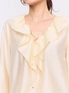 Elegant blouse with tie detail in butter color
