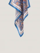 A silk scarf with a paisley pattern