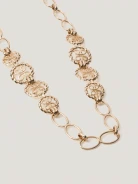 A metal strap with decorative links