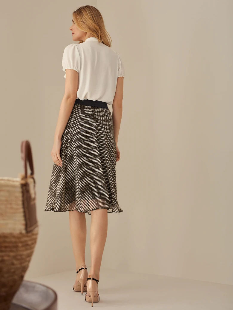 PLEATED SKIRT WITH CHECKERED PATTERN