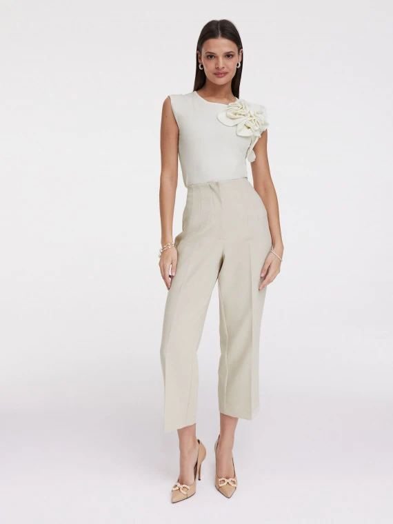 Cream blouse with three-dimensional flower