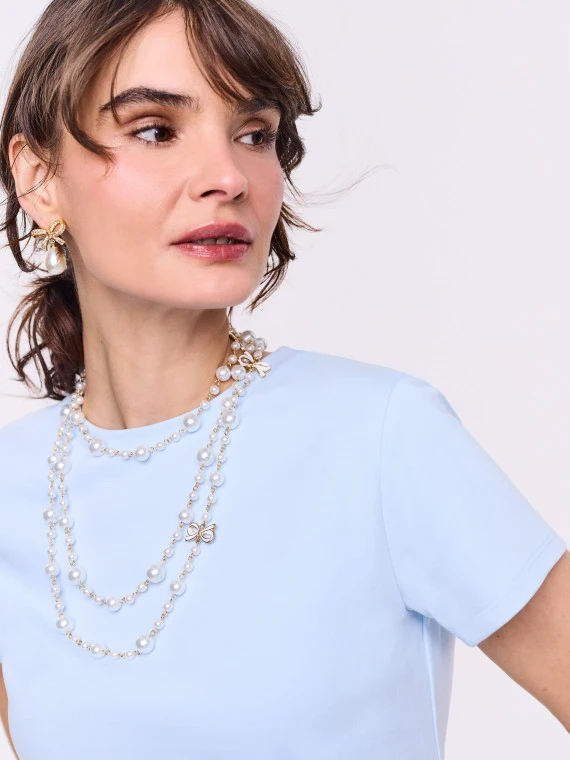 Blue cotton blouse with short sleeves