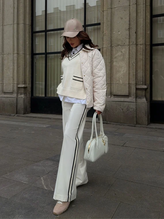 Cream pants with black piping