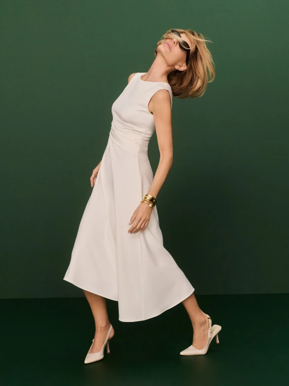 Light cream midi dress with slight asymmetry
