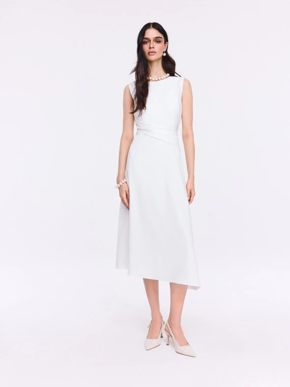 Light cream midi dress with slight asymmetry