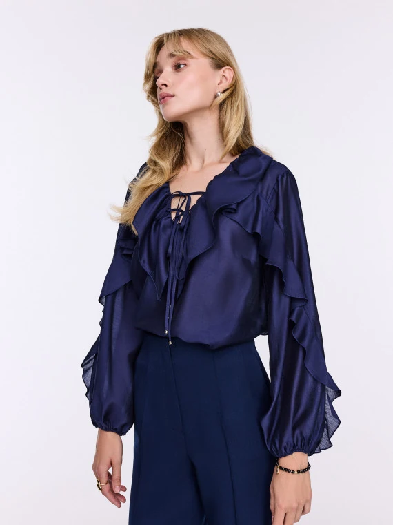 Navy blue blouse with frills and puffed sleeves