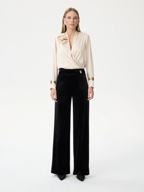 High-waisted black velour pants