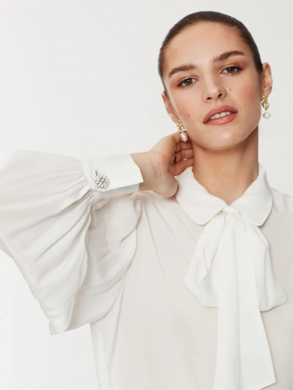 White tie-neck shirt