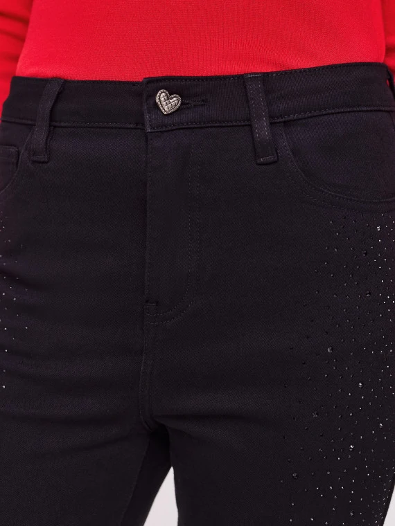 Fitted black pants with shiny rhinestones