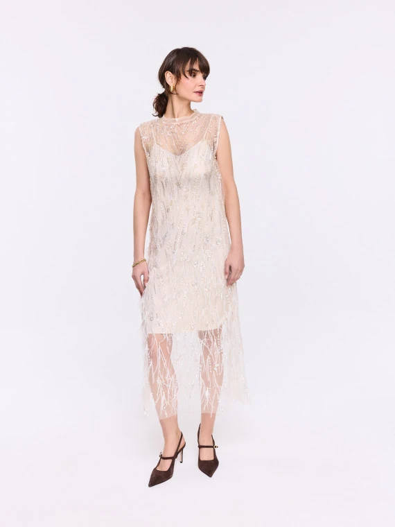 Cream dress with jeweled embellishments