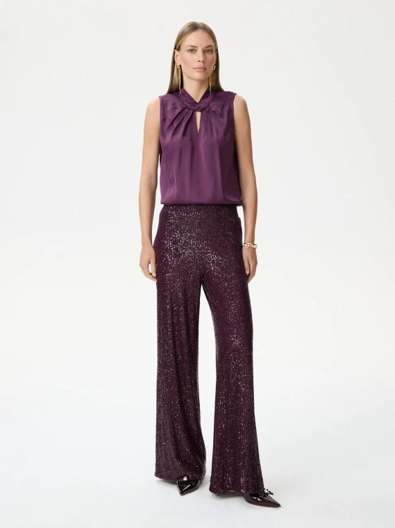 Long sequined pants in burgundy