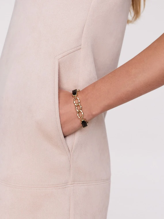 Gold color bracelet with glass stone