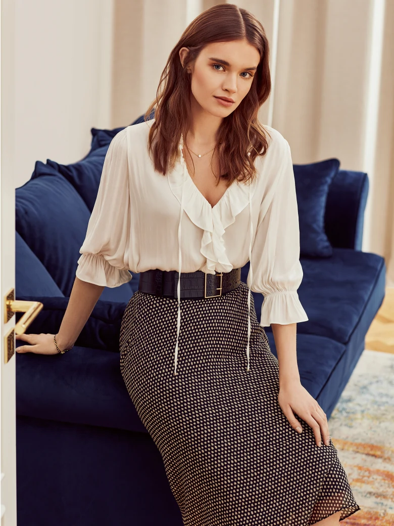 PLEATED SKIRT WITH CHECKERED PATTERN