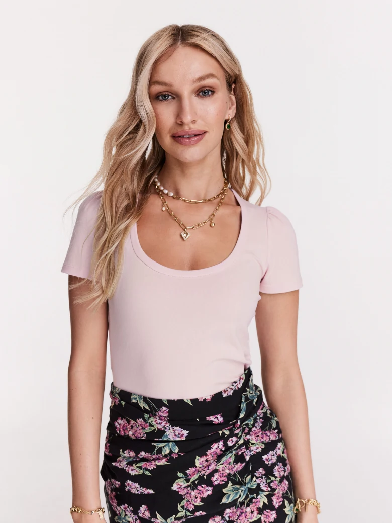 Light pink blouse with short sleeves