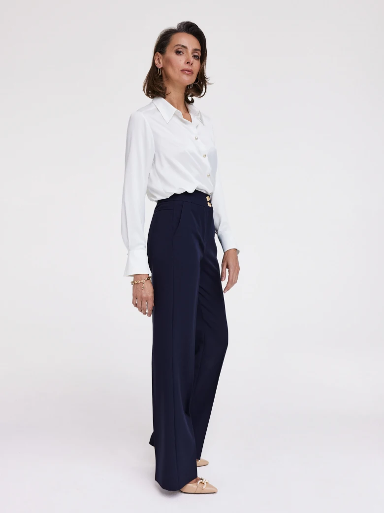 White shirt with decorative buttons
