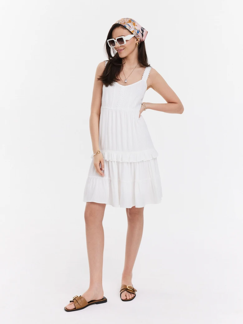 White dress with ruffles
