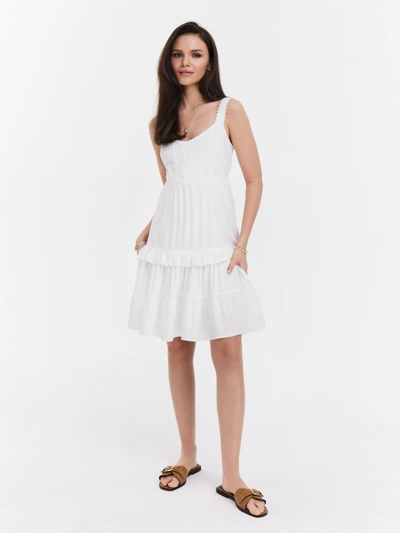 White dress with ruffles