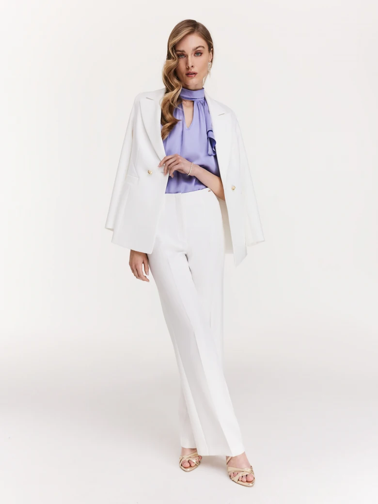 Elegant white pants with flared legs