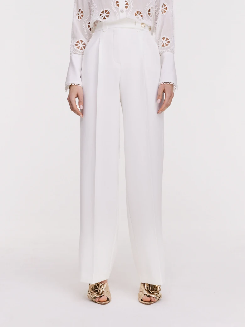 Cream pants with wide legs and high waist