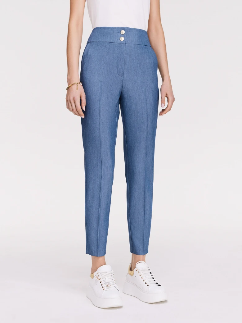 Blue pants with narrow legs and high rise