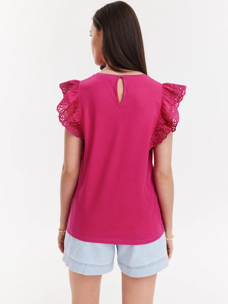 Pink blouse with openwork inserts