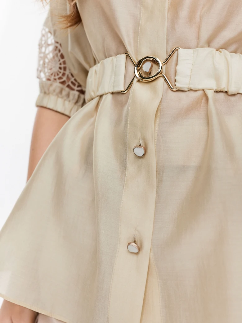 Beige shirt with openwork inserts