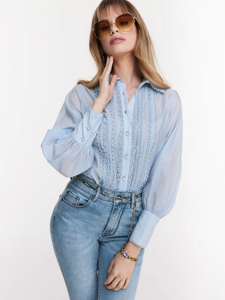 Blue shirt with decorative stitching