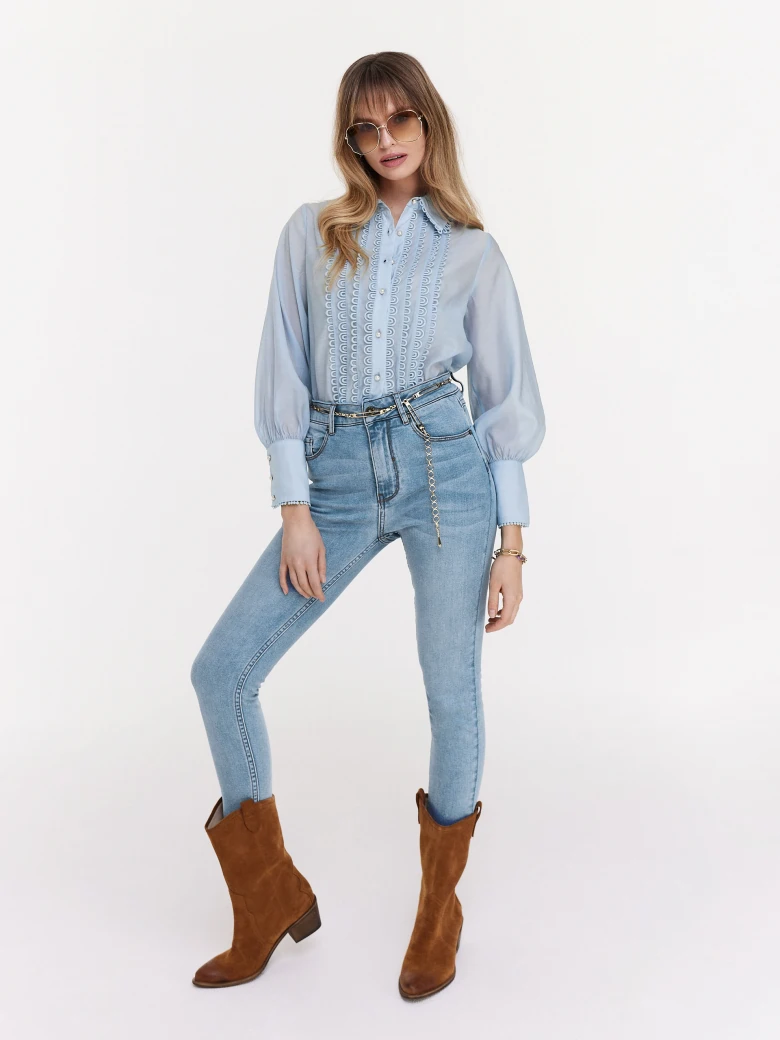 Blue shirt with decorative stitching