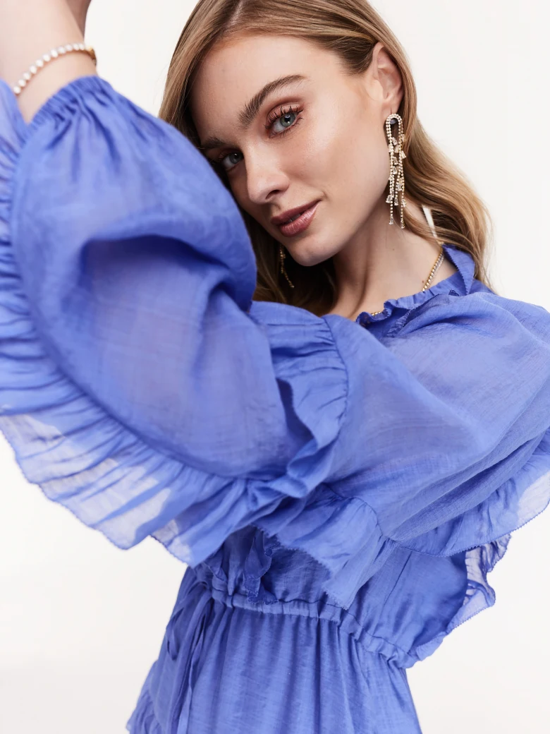 Short cornflower dress with ruffles and jabot
