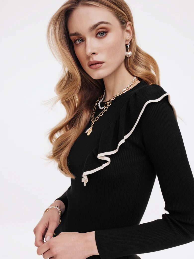 Fitted black dress with ruffles