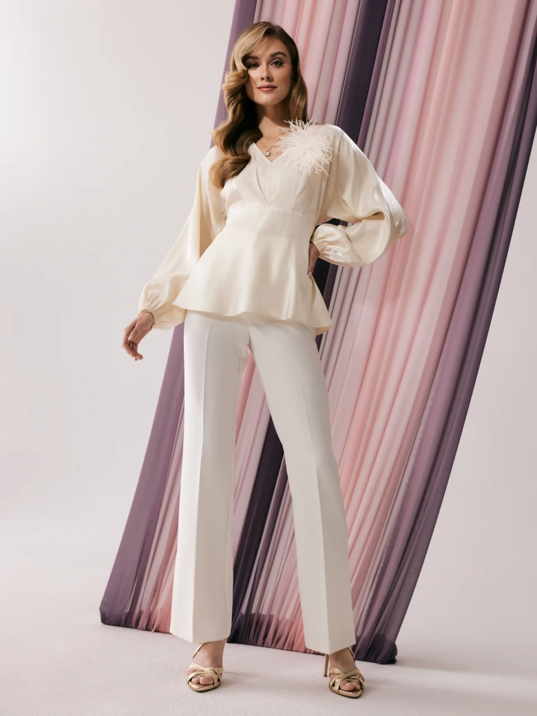 White pants with canted legs