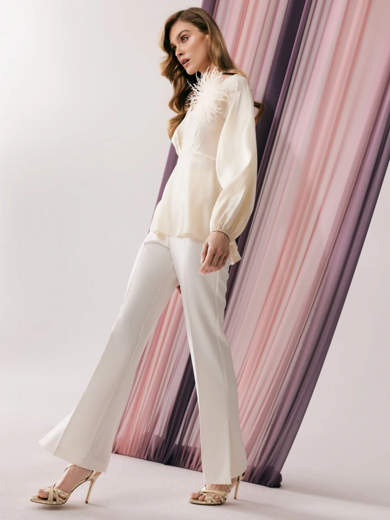 White pants with canted legs