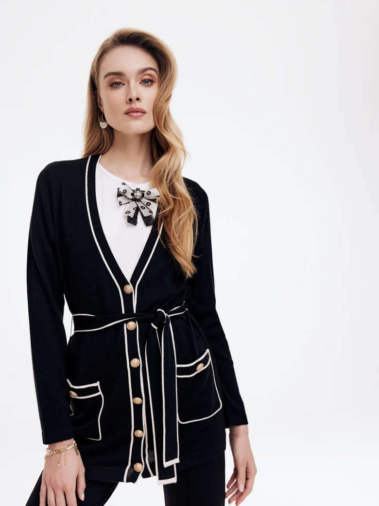 Black sweater with decorative buttons