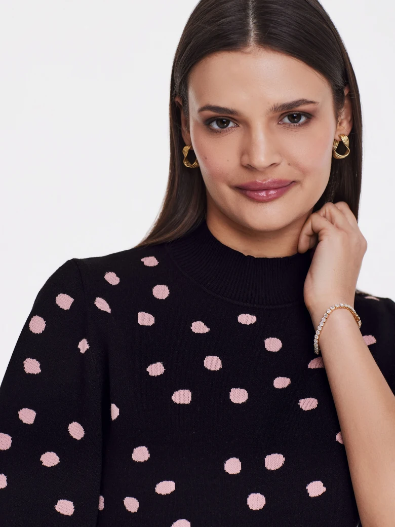Black sweater with peas