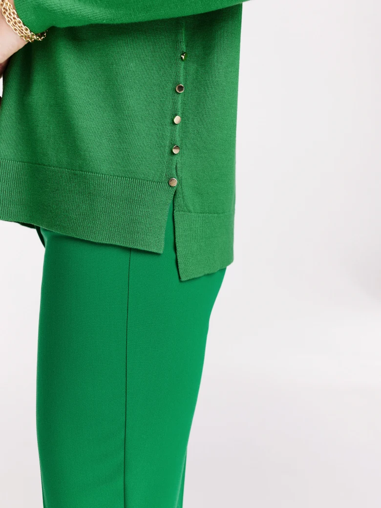 Green sweater with a heart neckline