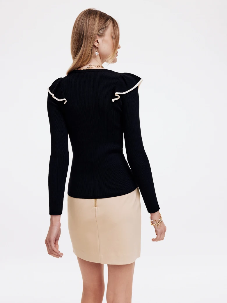 Black sweater with decorative ruffles