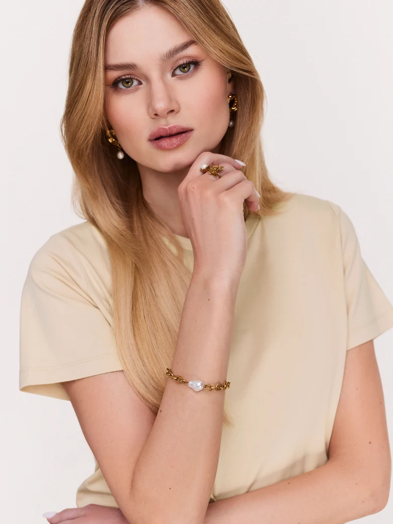 Beige loose blouse with short sleeves