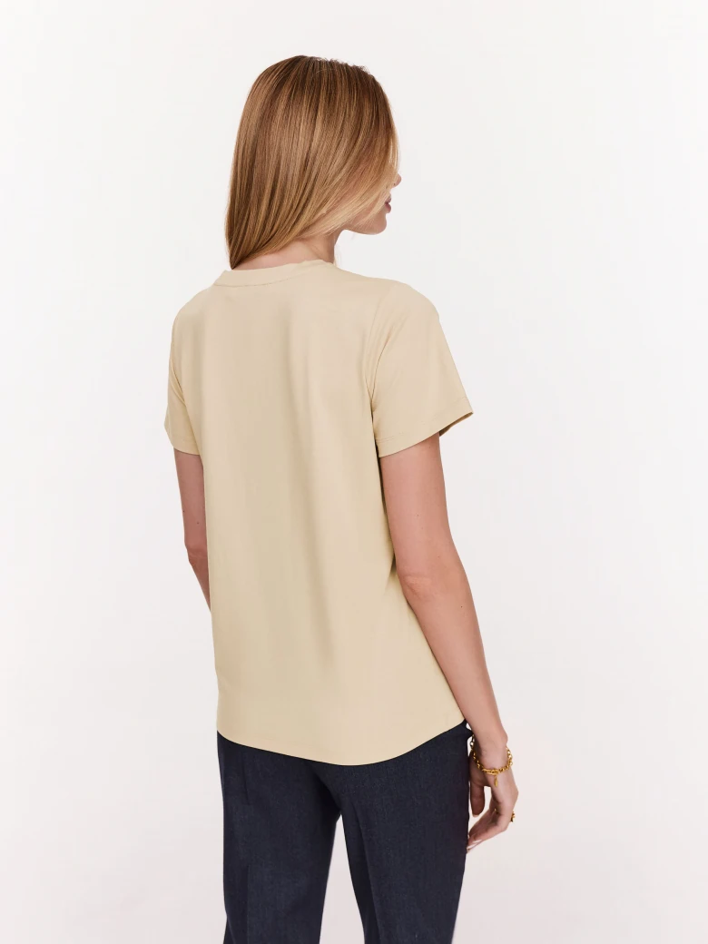 Beige loose blouse with short sleeves