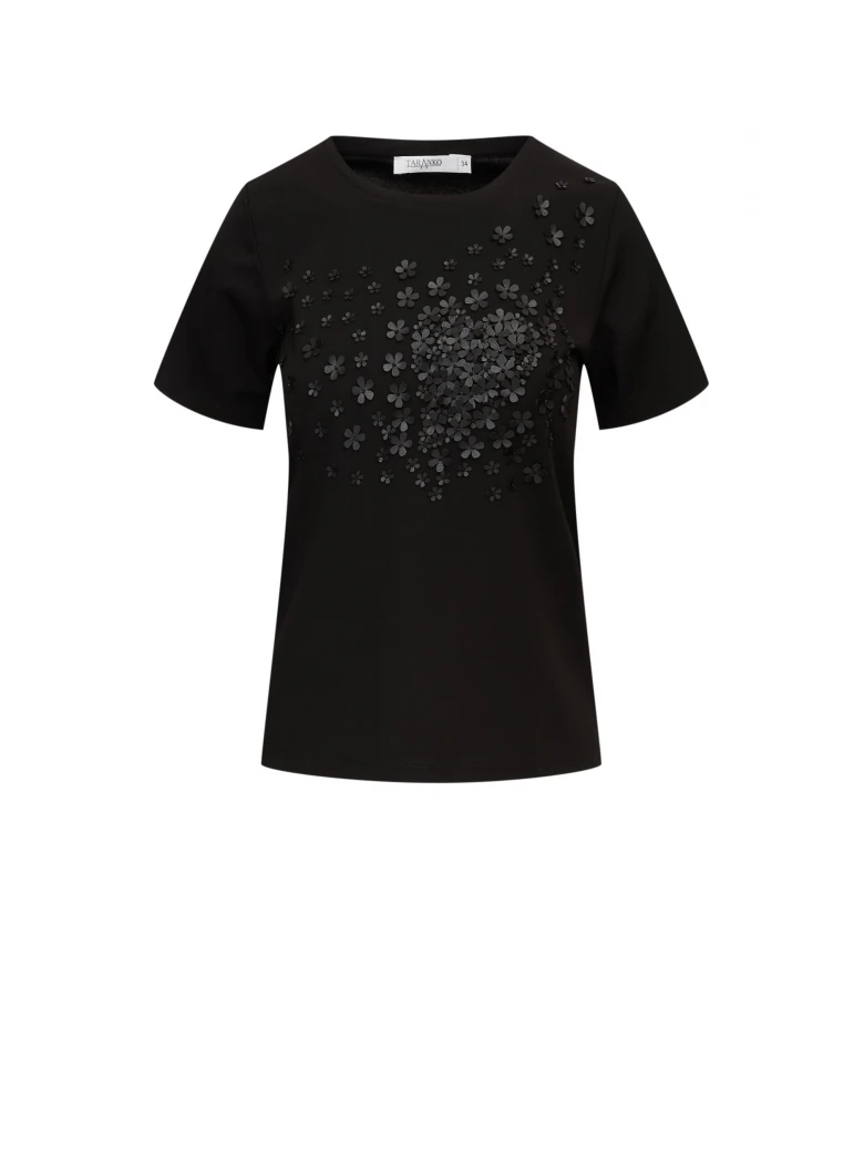 Black blouse with short sleeves and floral appliqué